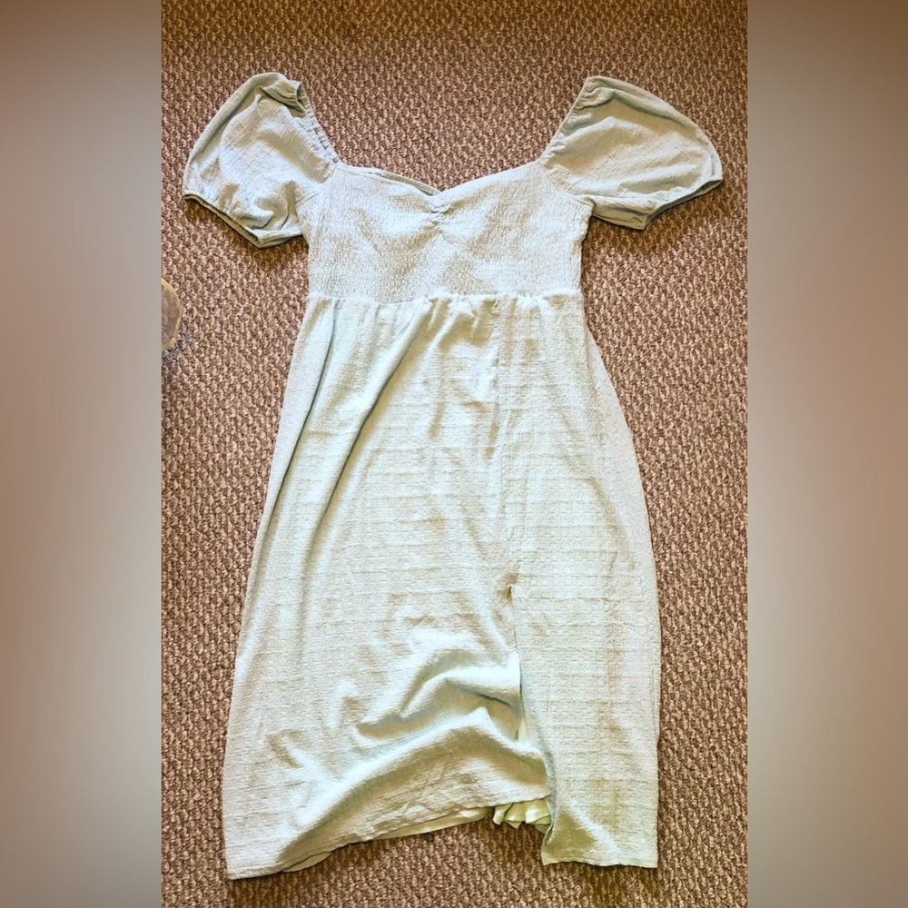 Boutique baby blue dress with puffed sleeves and cross-criss back. Adorable! - Picture 2 of 6